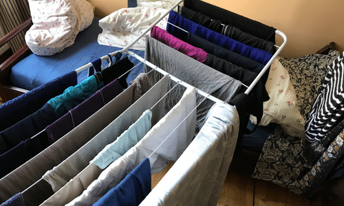 Drying clothes in bedroom